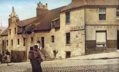 A Postcard showing Thatched Houses in Ladywell Street lookingNorth across Duke Street, Glasgow 1902
