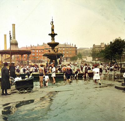 Children playing  at the fountain in Phoenix Park, Glasgow 1930

