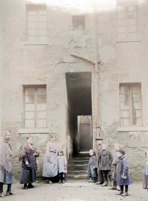 Gathering Of People At A Close On Garngad Road  Back Court, Glasgow Circa 1920
