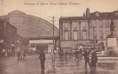 Looking along George Square to Queen Street Station, with the former parcel office, left, beside the entrance.
