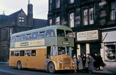 Passengers boarding a bus on Maryhill Road Glasgow 1960s
