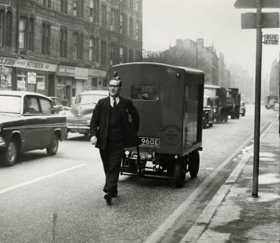 Postal worker on Maryhill Road Glasgow 1960s
