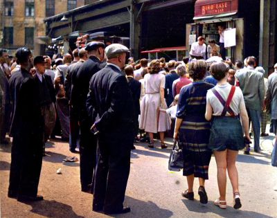 The Barras, 1955. A Crowd has gathered in front of the Bird Ease Footwear Stall in the popular East End market

