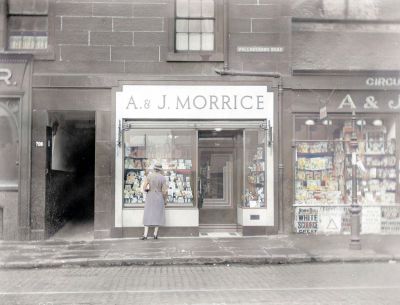 Window shopping on Pollokshaws Road, Glasgow  1935.
