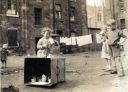 Children_happily_playing_in_the_back_courts_of_a_Glasgow_Tenement_1960s.jpg