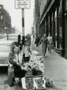 Filename=Flower_seller_Bessie_Swan__Sauchiehall_st_Glasgow_1956.jpg
Filesize=123KiB
Dimensions=727x960
Date added=Oct 13, 2021 Flower_seller_Bessie_Swan__Sauchiehall_st_Glasgow_1956.jpg