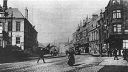 Maryhill_Road_Glasgow_at_the_Junction_Between_Gairbraid_Avenue_And_Lochburn_Road_Circa_1890s.jpg