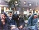 Sitting_On_A_Bench_In_Phoenix_Park_Glasgow_1911.jpg