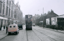 Tram_on_Maryhill_Road_Heading_Towards_Bilsland_Drive_Glasgow_Circa_Early__1960s.png