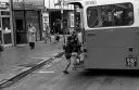 Two_Young_Boys_Boarding_A_Bus_Outside_Of_The_Grosvener_Cinema_On_Byres_Road_Glasgow_West_End_1969.jpg